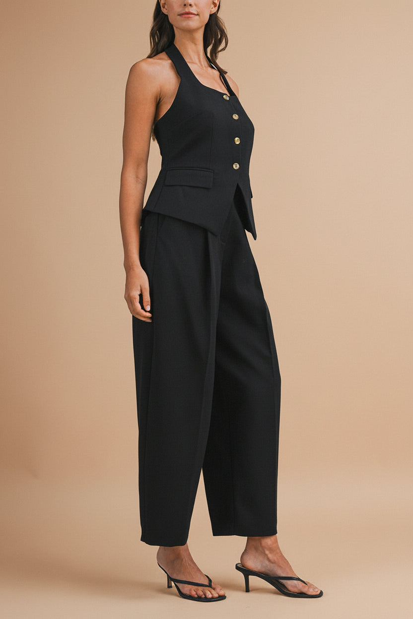 side view of a woman wearing Raichur Black Structured Halter Top from La petite garçonne