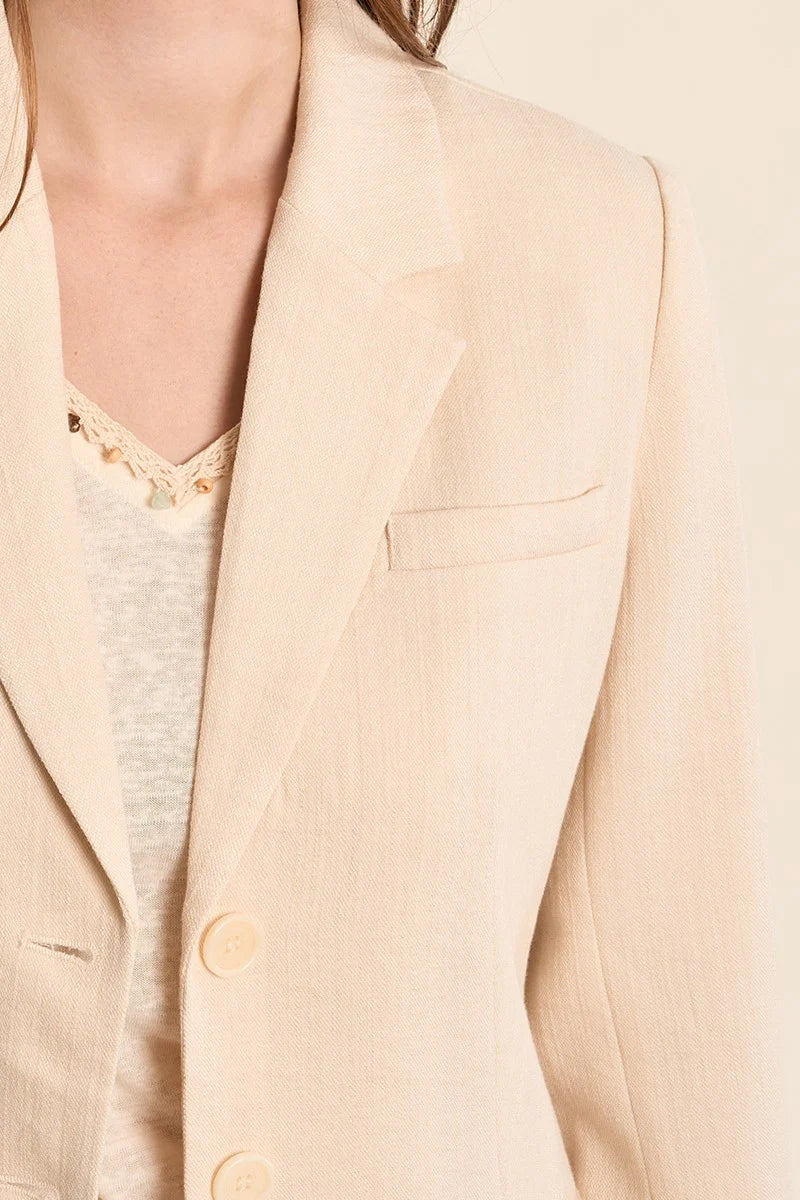 Close-up of woman wearing Rajmahal Structured Ivory Blazer from la petite garçonne