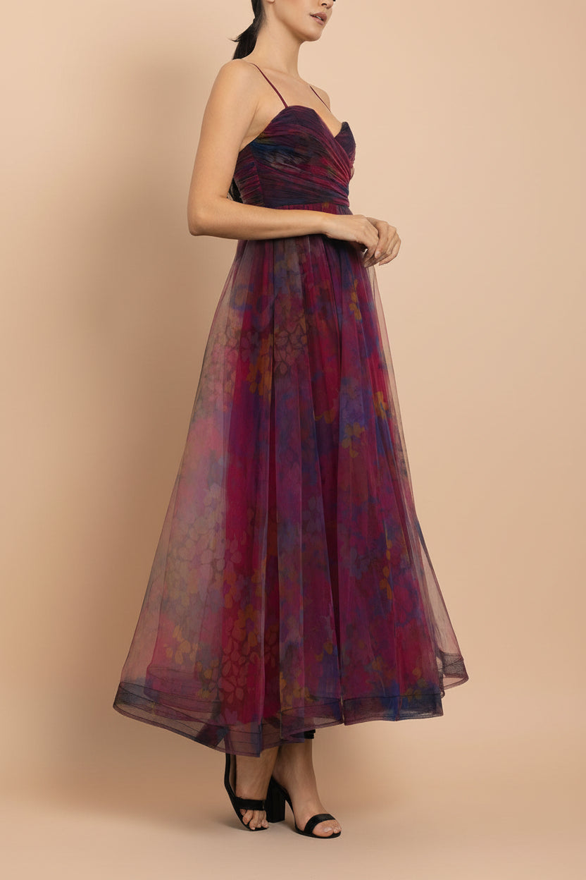 side of a woman wearing Rayne Burgundy Floral Midi Tulle Dress from Boutique 1861