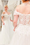 Kahena | Off-The-Shoulder Bridal Gown w/ Floral Embroidery- boutique 1861 on model