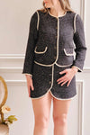 Kannon | Short A-Line Black Tweed Skirt- boutique 1861 on model