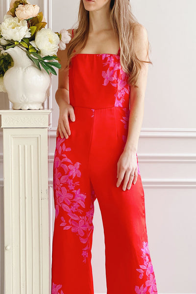 Sherry | Red Floral Satin Jumpsuit w/ Slits- Boutique 1861 on model close up