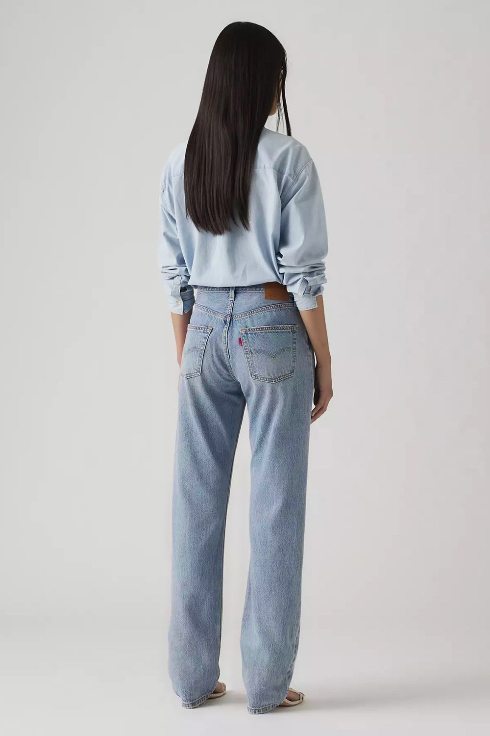back of a woman wearing Rovereto Mid-Rise Blue Denim Pants from La petite garçonne