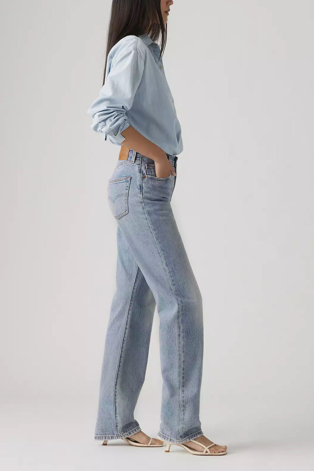 side of a woman wearing Rovereto Mid-Rise Blue Denim Pants from La petite garçonne