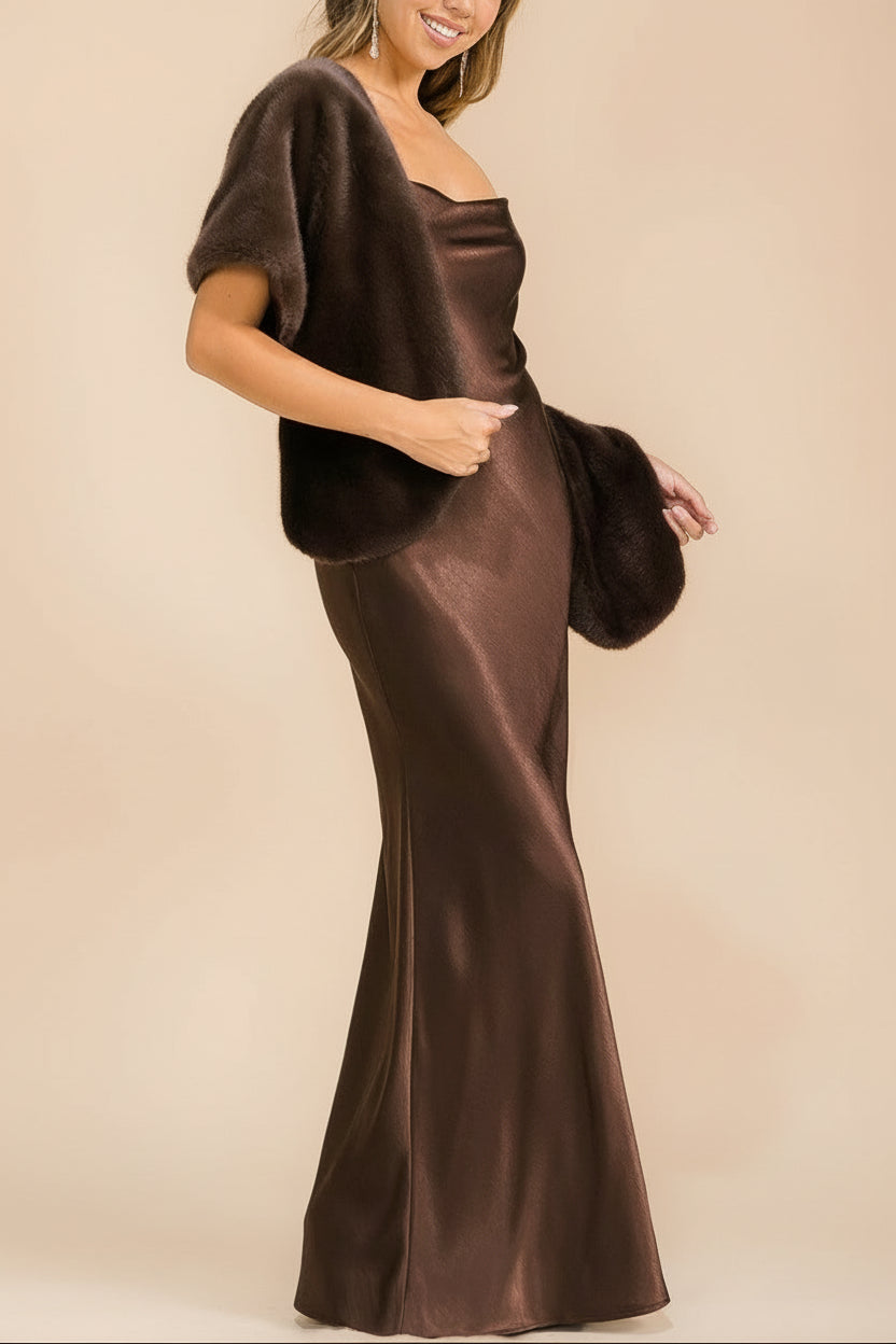 Side view of a Woman wearing the Safiya brown Satin Maxi Dress with Faux Fur Shawl from boutique 1861