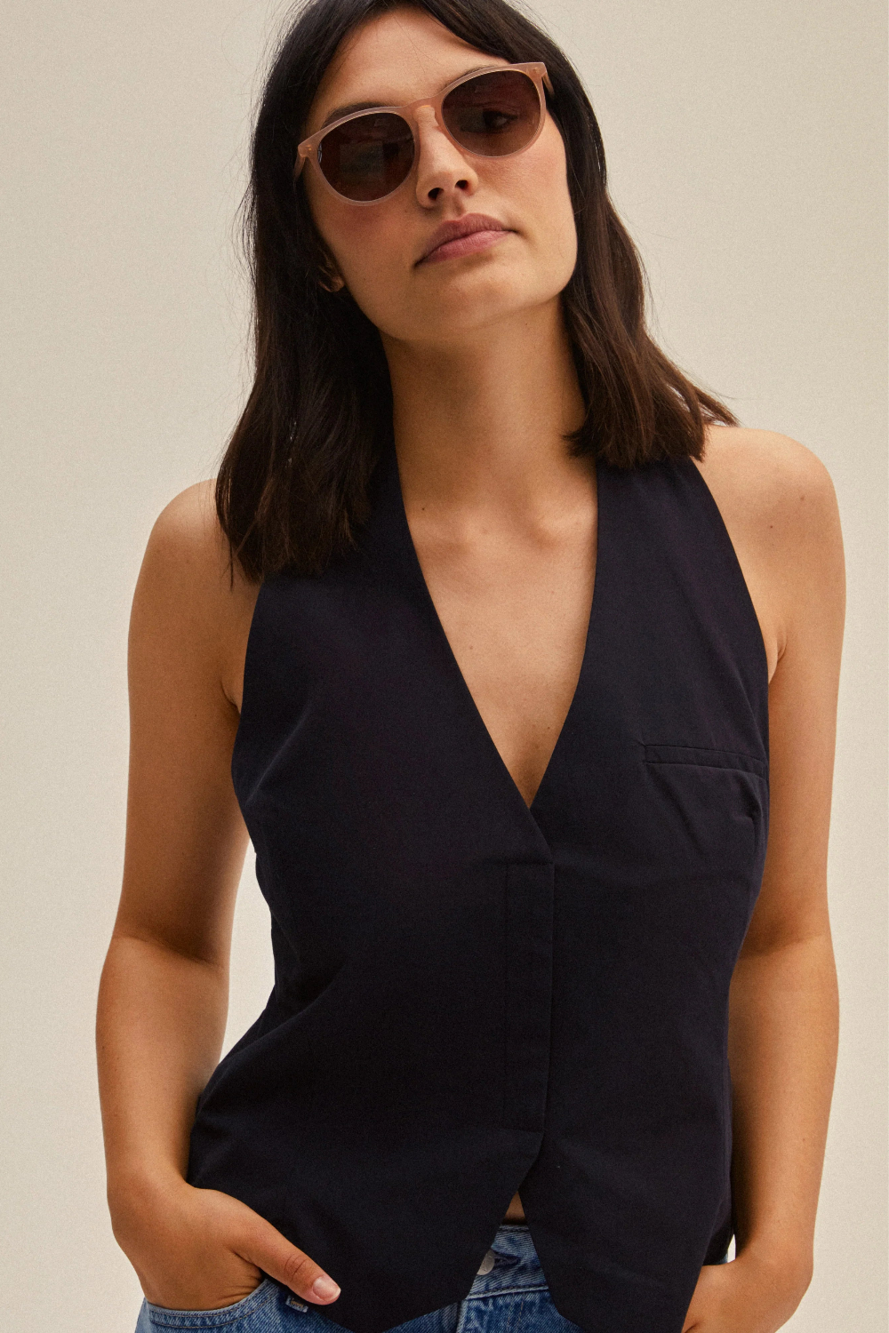 Woman wearing brown sunglasses by Pilgrim available at la petite garçonne