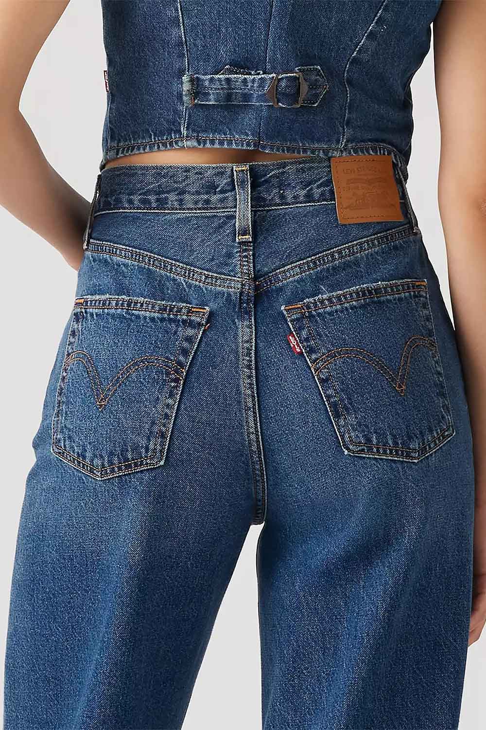back close-up of a woman wearing Sarzana High Rise Blue Denim Pants from La petite garçonne 