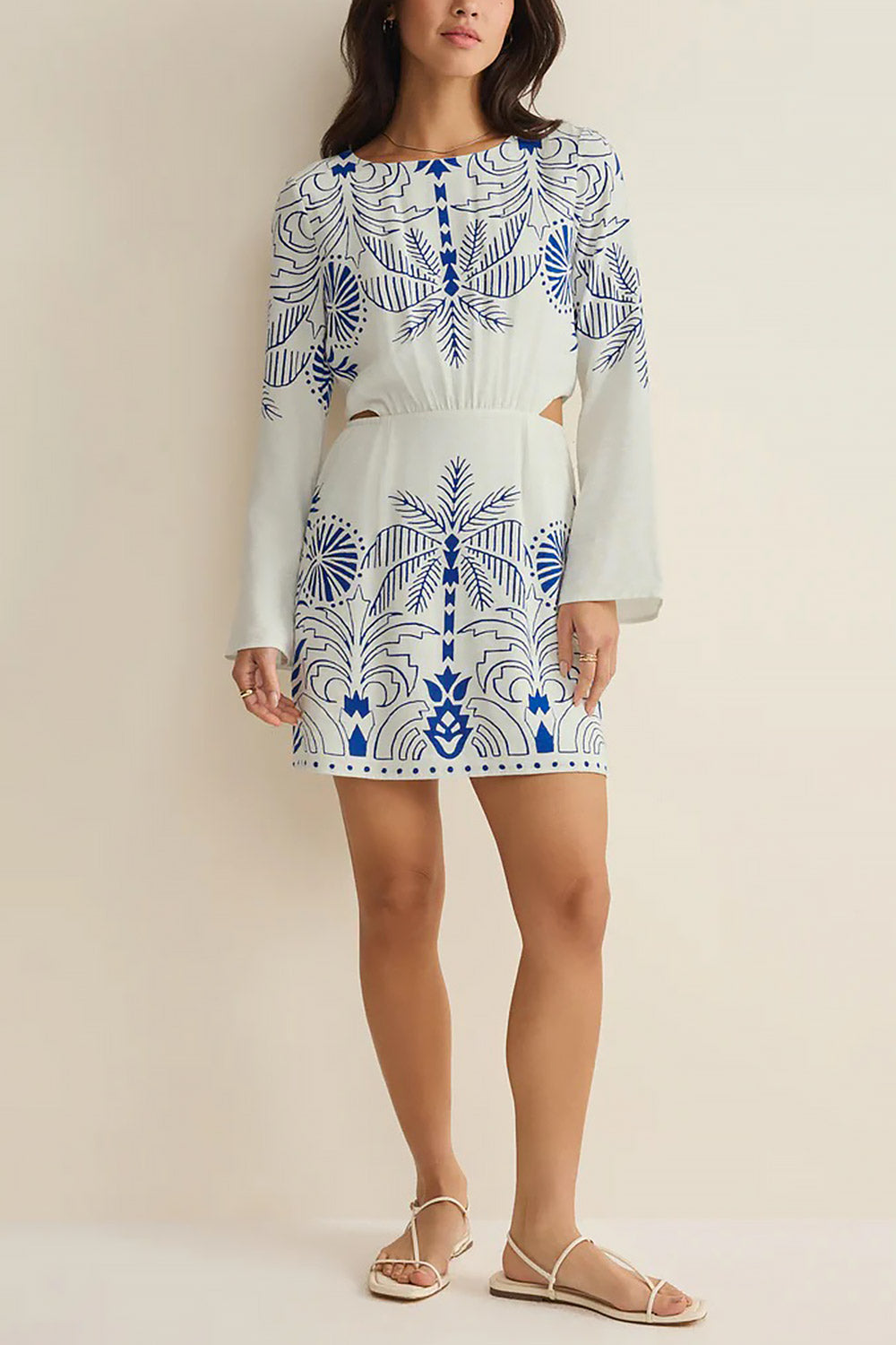 Model wearing Sharon Short White Dress with Contrast Print | Boutique 1861 front