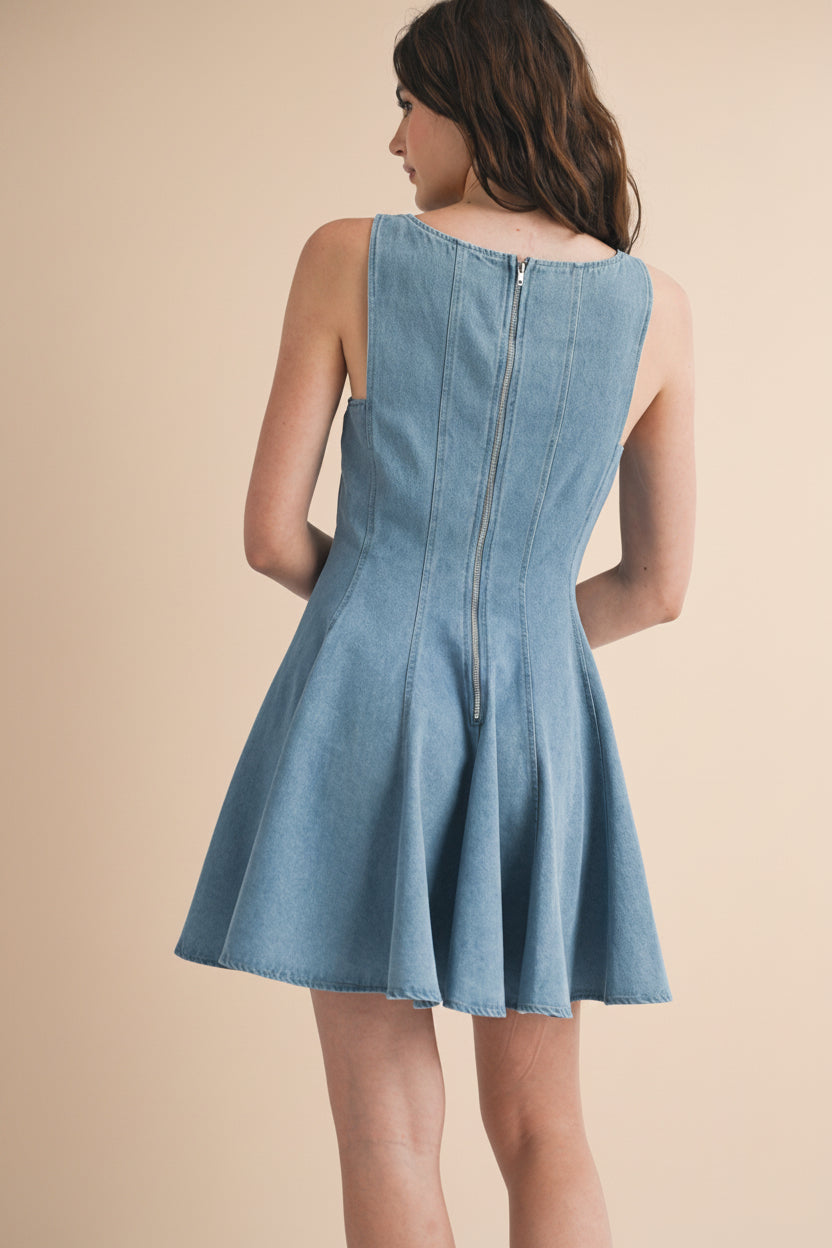 backview Woman wearing Sorrento Blue Sleeveless Denim Short A-Line Dress at la petite garçonne