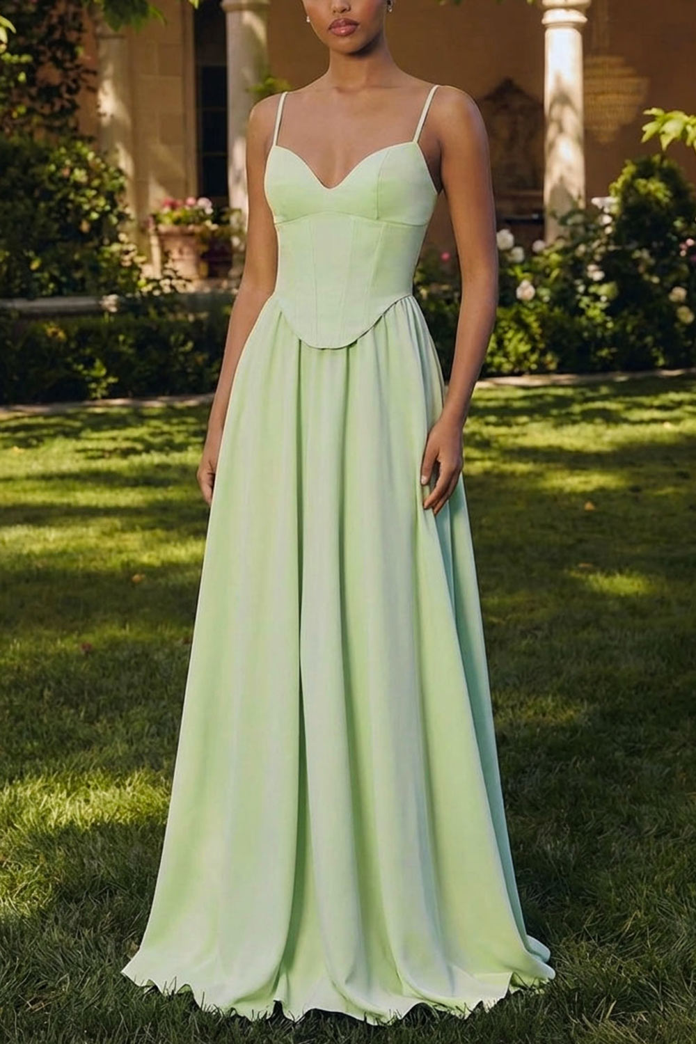 front of a woman wearing Syana Sage Long Chiffon Corset Dress from Boutique 1861