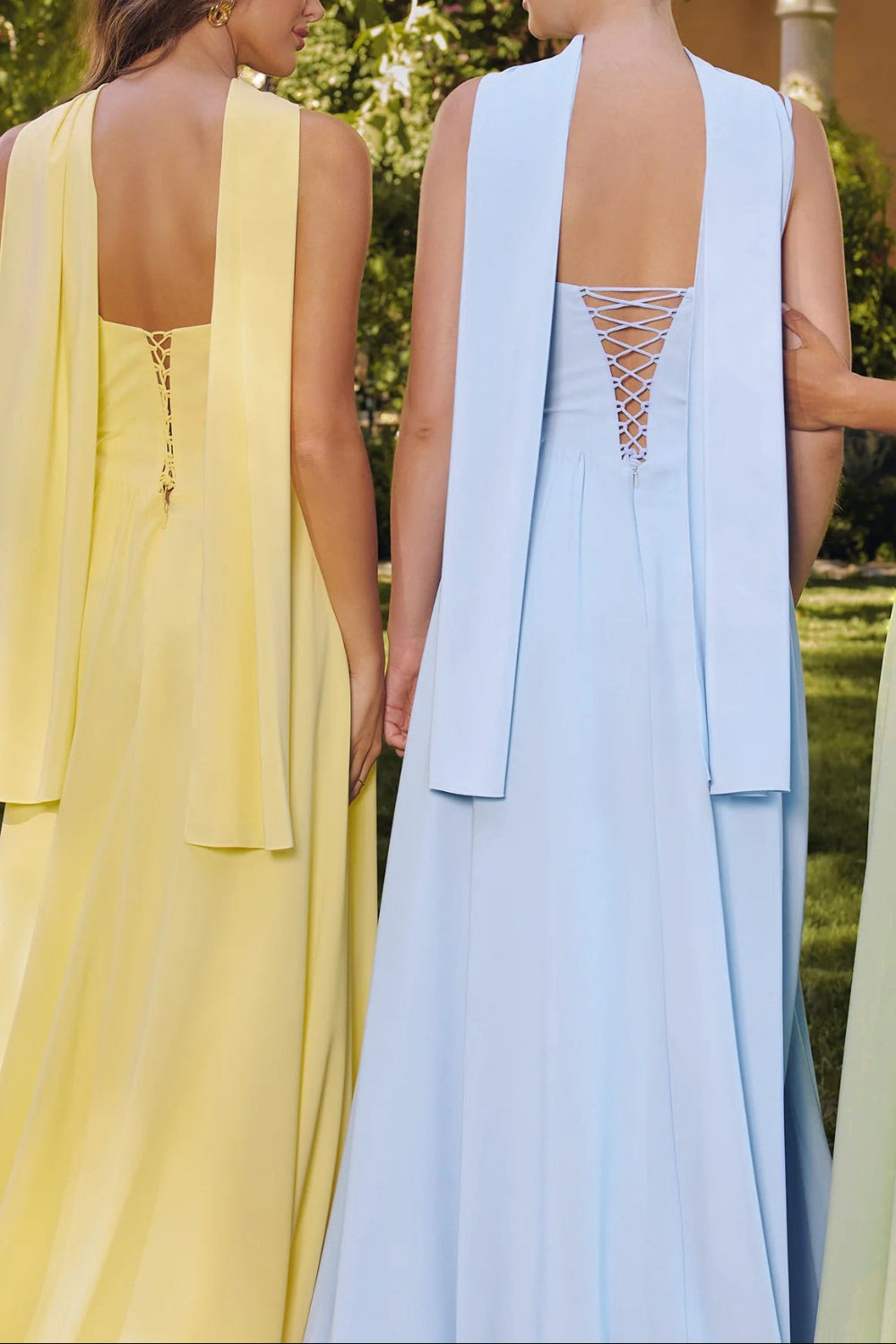 back close-up of a woman wearing Syana Light Yellow Long Chiffon Corset Dress with Scarf from Boutique 1861