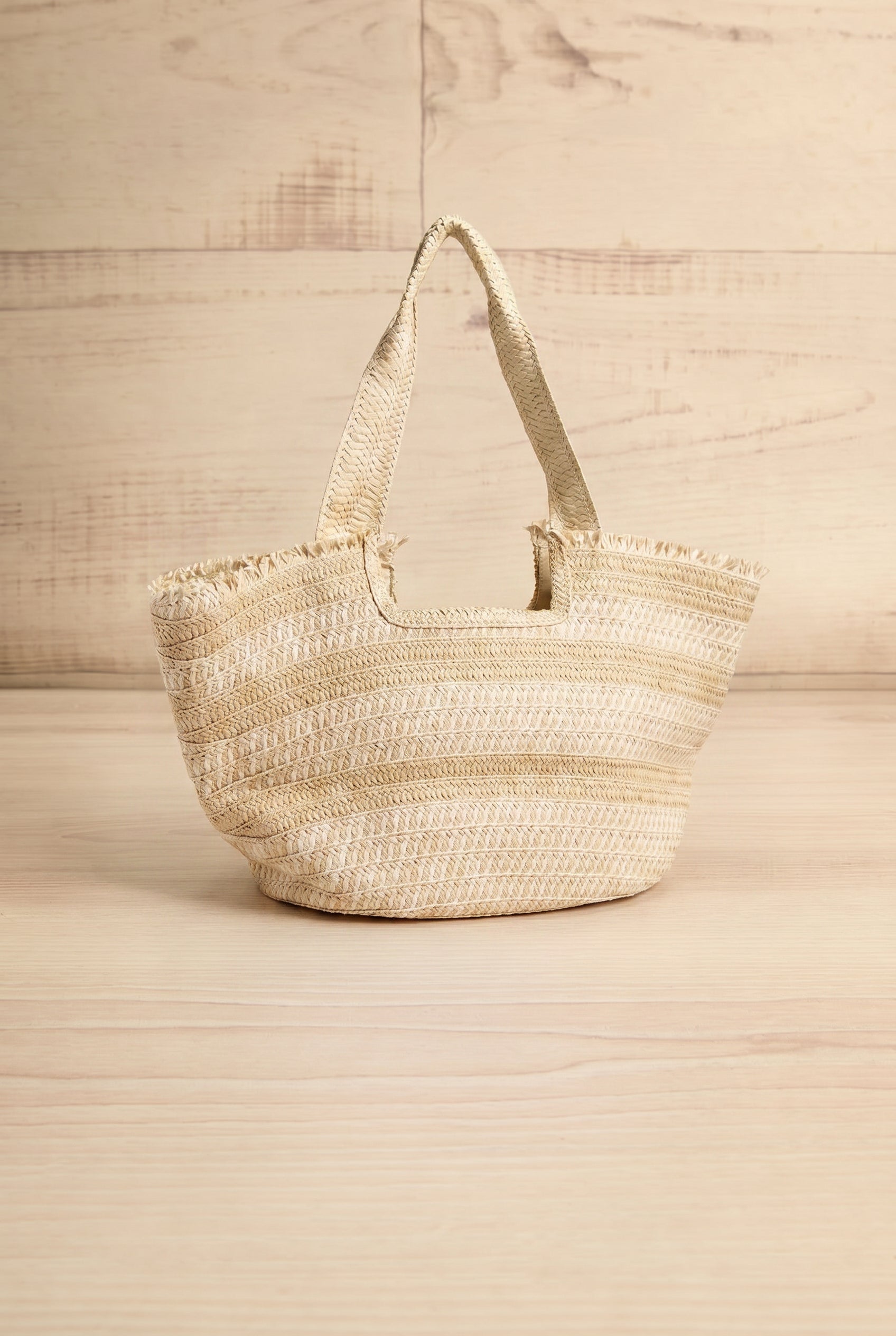 Saturday Woven Straw Tote Bag with Braided Handles from la petite garçonne