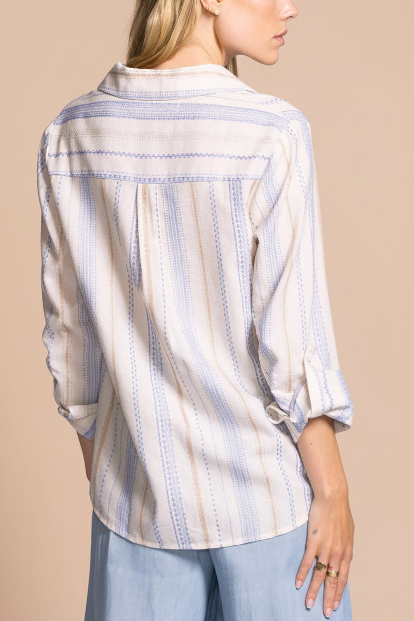 back view of a woman wearing Tubah Blue Long Sleeves Striped Button-Up Shirt from La petite garçonne