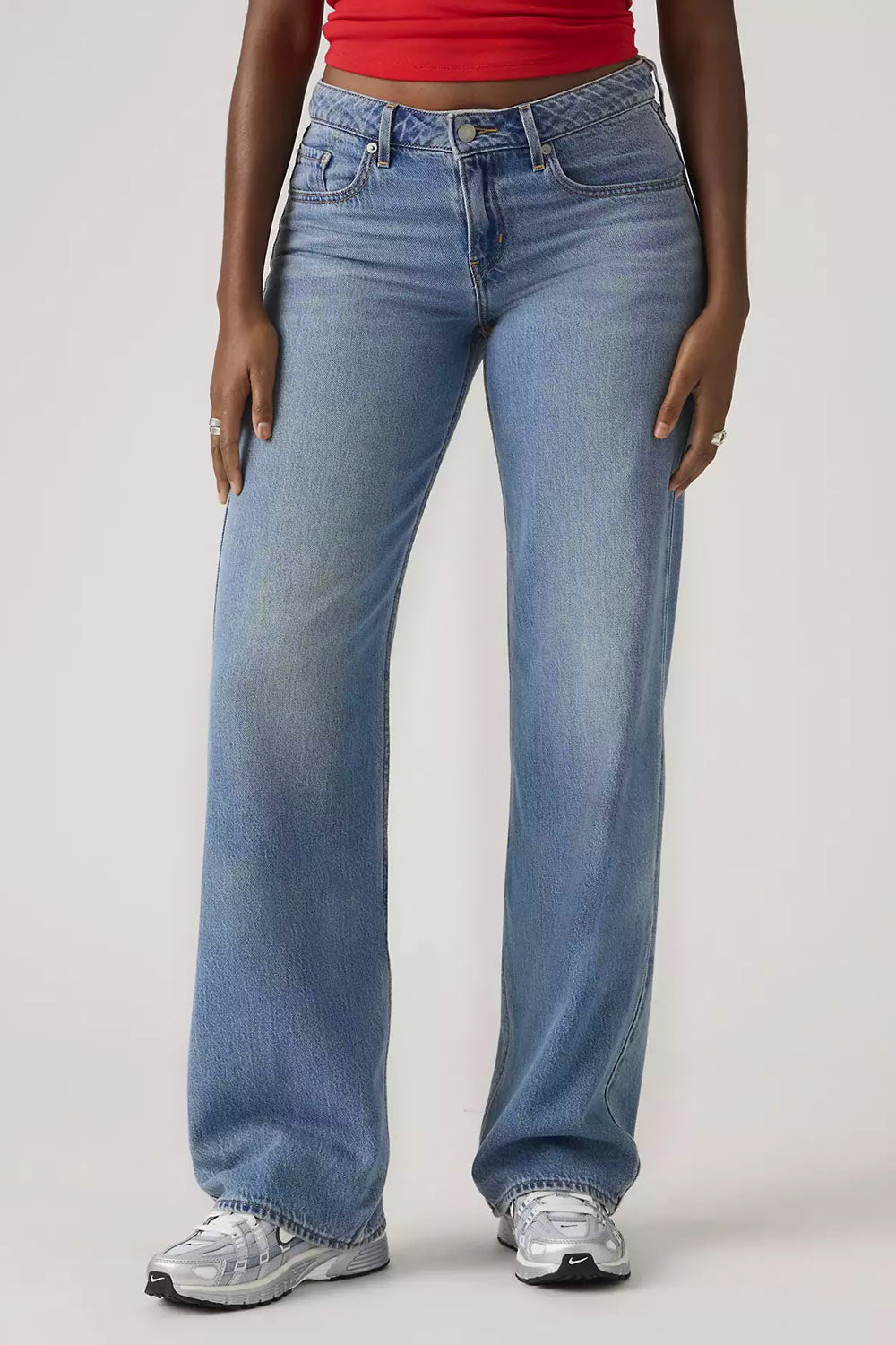 front close-up of a woman wearing Tuscania Low Rise Blue Denim Pants from La petite garçonne 