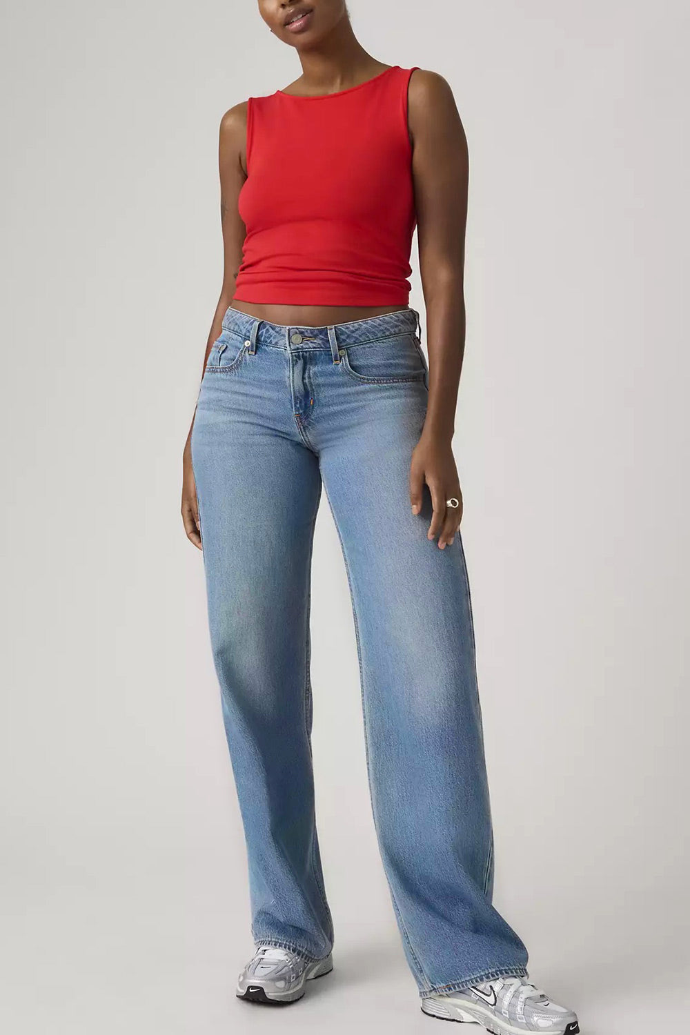 front of a woman wearing Tuscania Low Rise Blue Denim Pants from La petite garçonne 