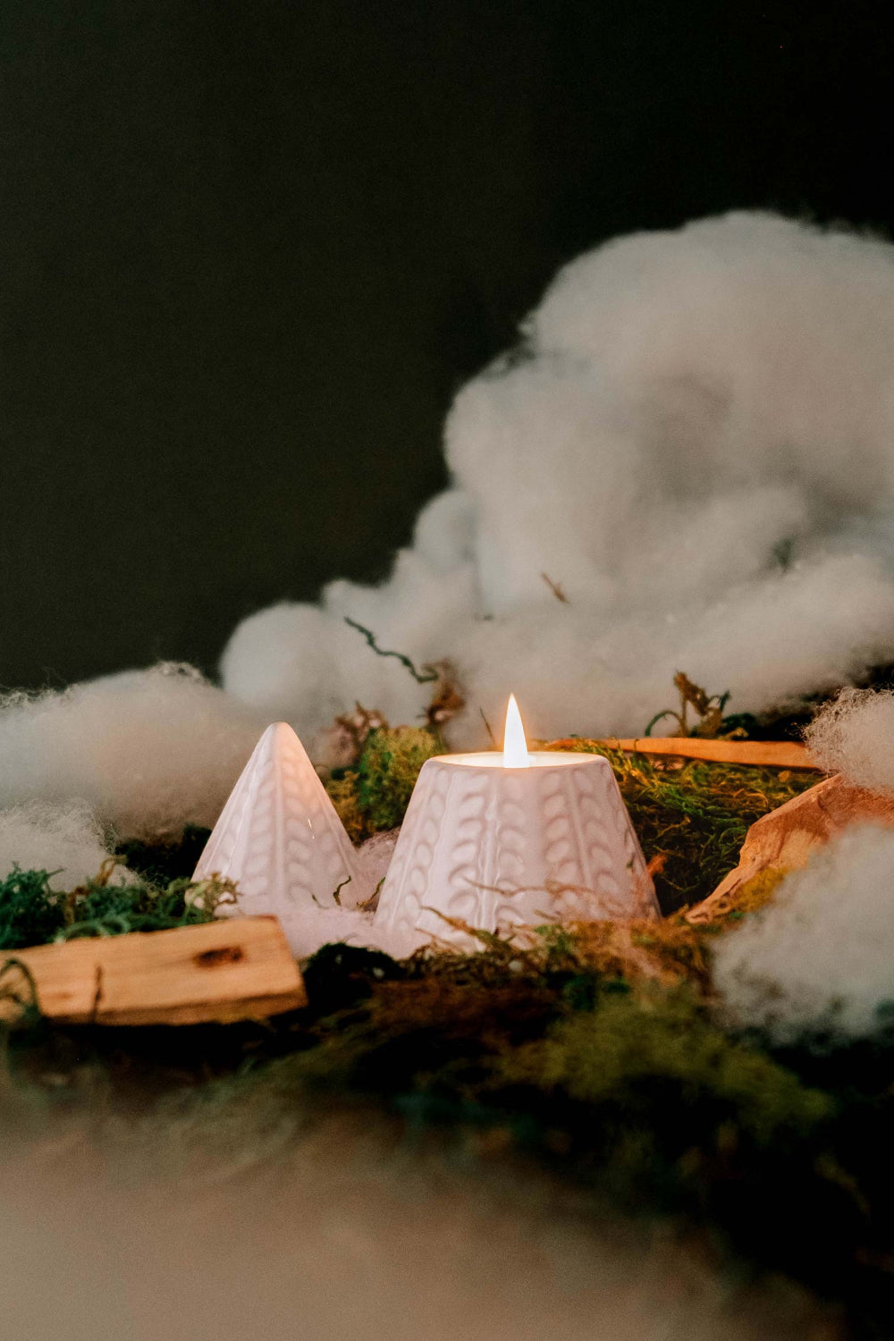 The Little Fir Tree Candle by mimi and august in a textured holder with cotton and greenery