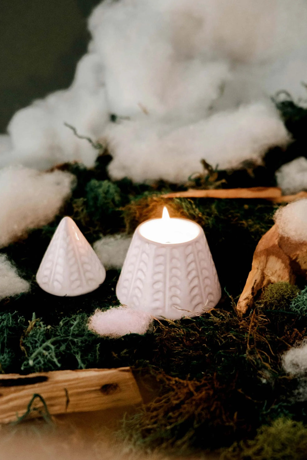 The Little Fir Tree Candle by mimi and august in a textured holder with cotton and greenery
