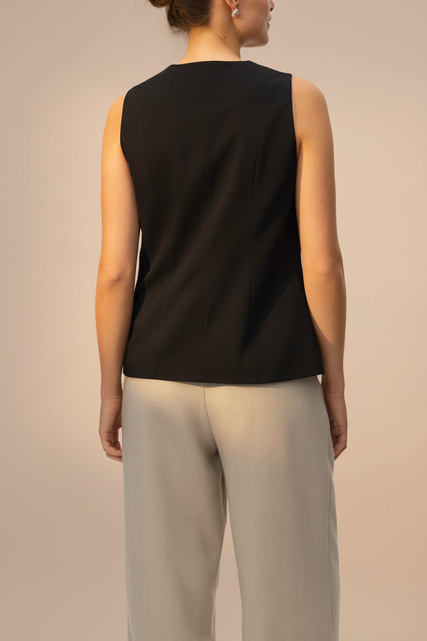 back of a woman wearing Vellore Black Tailored Buttoned Vest from La petite garçonne