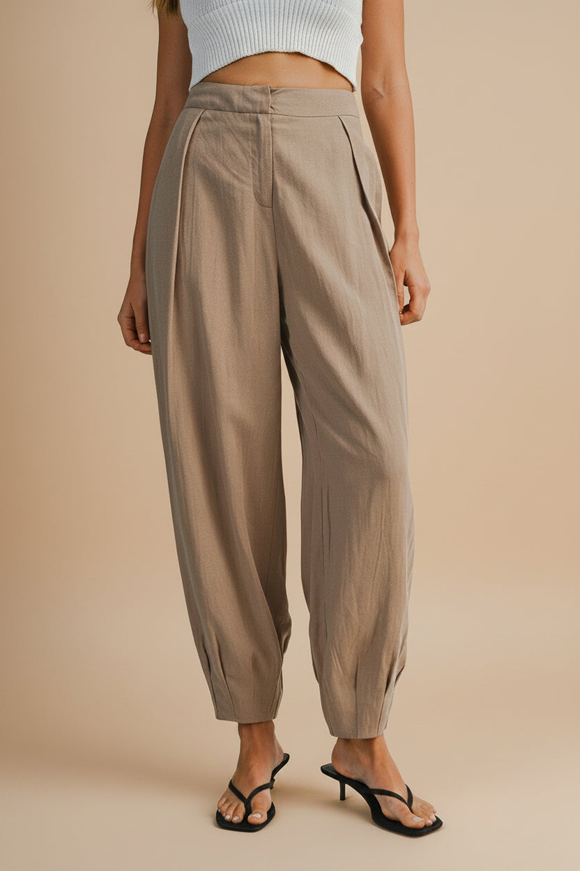 Front view of a Woman wearing the Veraval Taupe Barrel Cut Pants from la petite garçonne