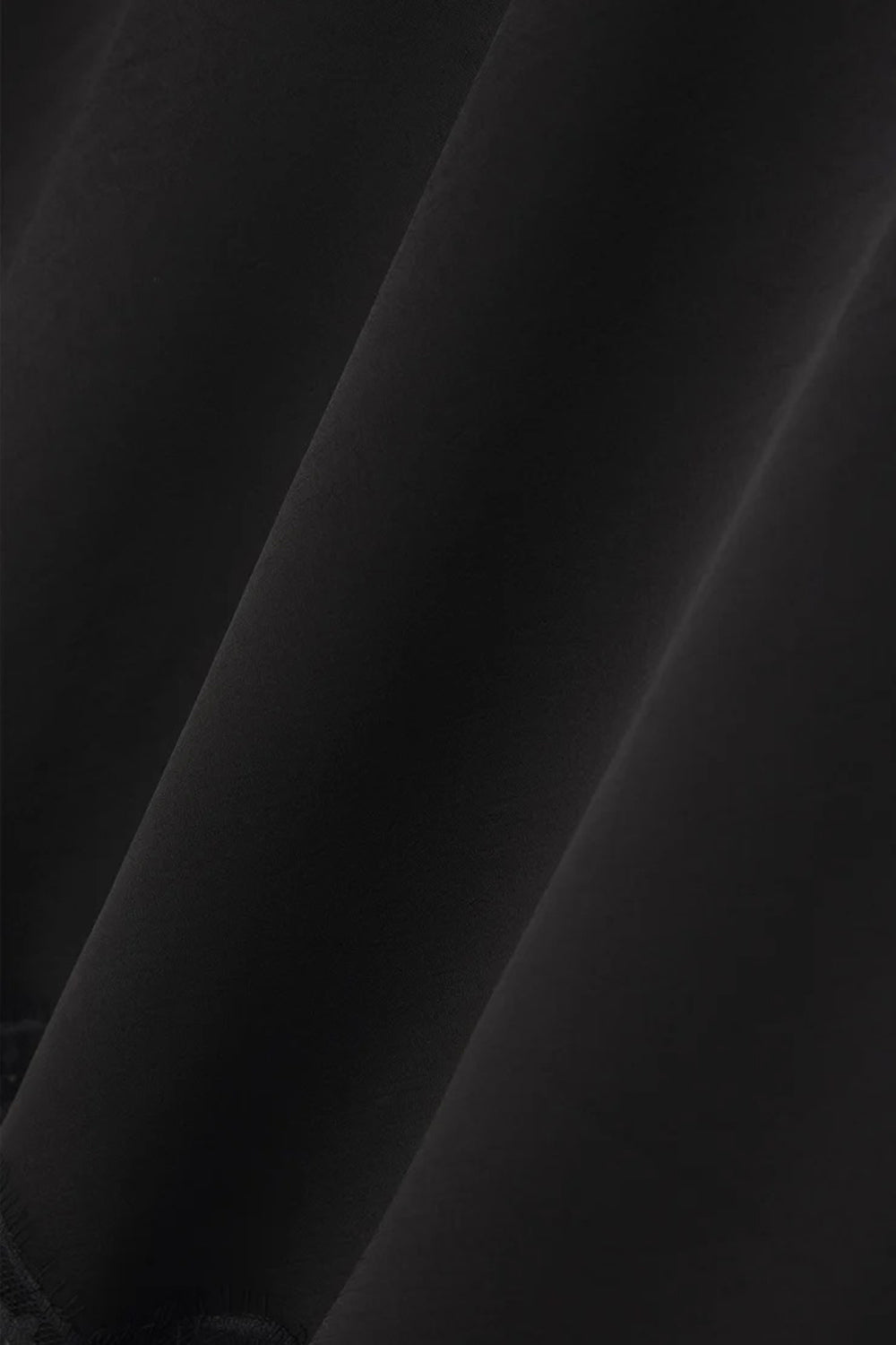 Vrako Black Midi Satin Skirt with Lace | La petite garçonne fabric close-up