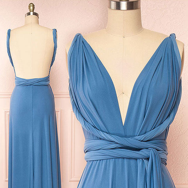 Blue dress on a mannequin against a light pink background
