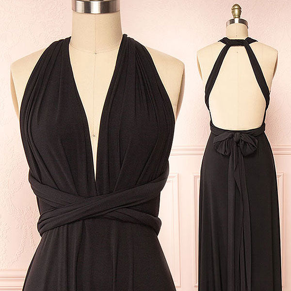 Black halter neck dress on a mannequin against a light pink background