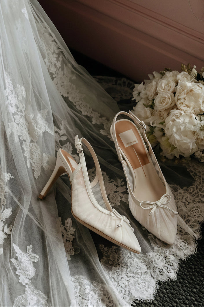Top view of Dolce Vita Yela Ivory Pleated Mesh Slingback Pumps with Bow at boutique 1861