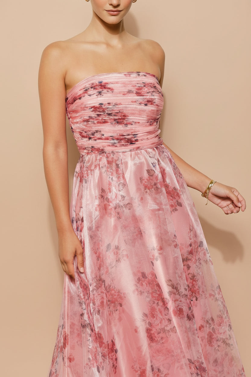 close-up of women wearing Zouleikha Pink Floral Maxi Strapless Dress from Boutique 1861