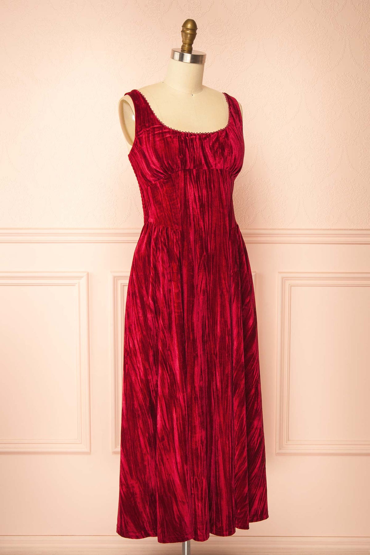 side view Adela Red Velvet Midi Dress with Fitted Bodice and Pockets at Boutique 1861