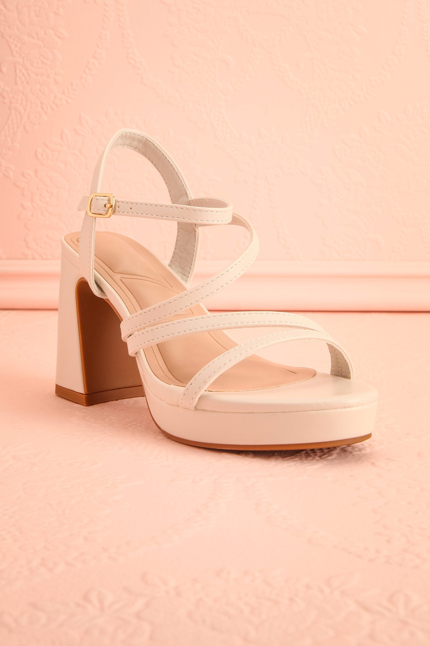 Profile view of Adina Ivory Strappy Platform Sandals with Block Heel at boutique 1861