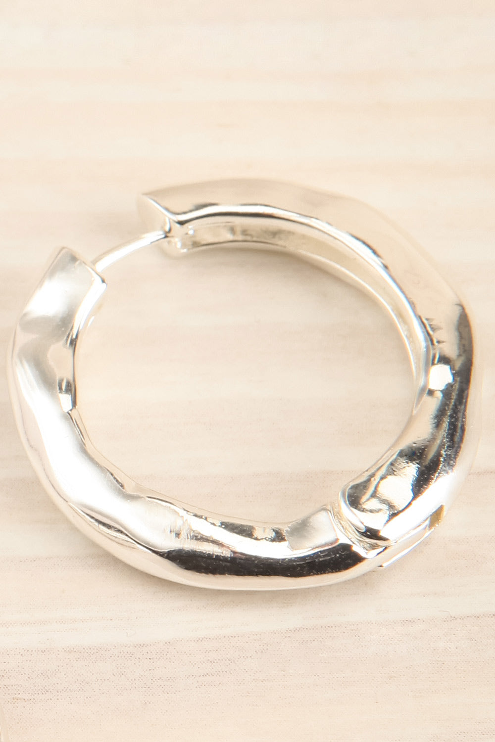 Aerith Silver Asymmetrical Hoop Earrings | La petite garçonne close-up