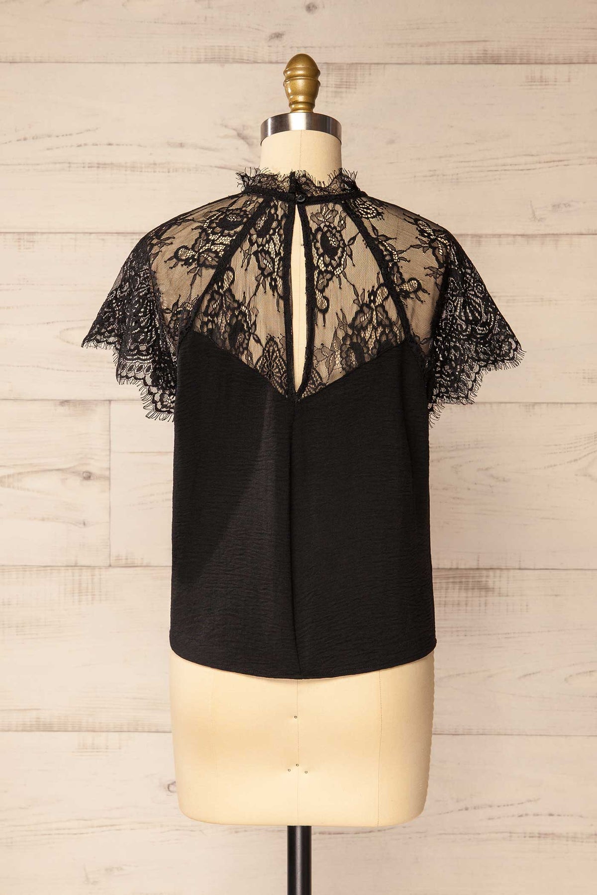 back view of Aksu Black Lace Yoke High-Neck Short Sleeve Top at La petite garçonne