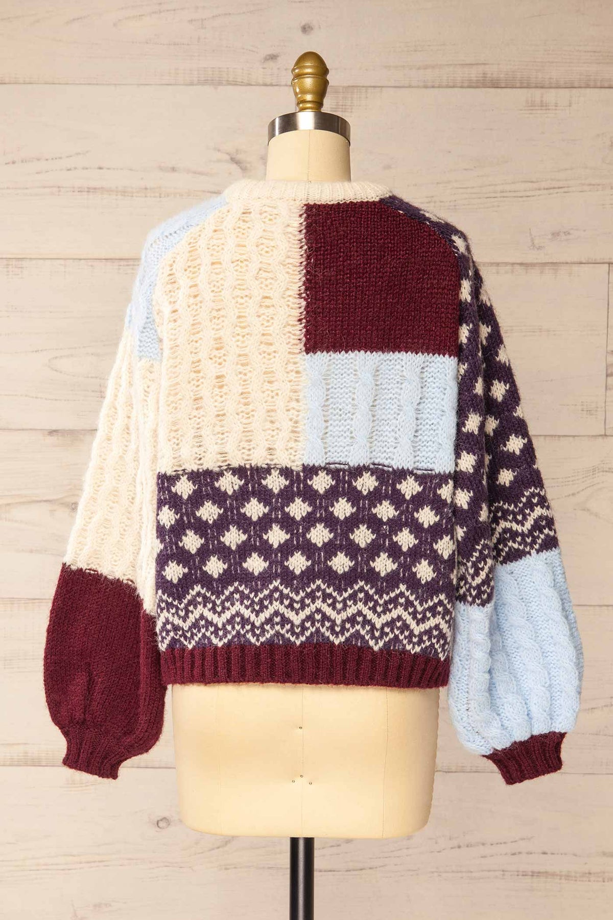 back view of Alamo Multicolour Patchwork Cable Knit Sweater at La petite garçonne