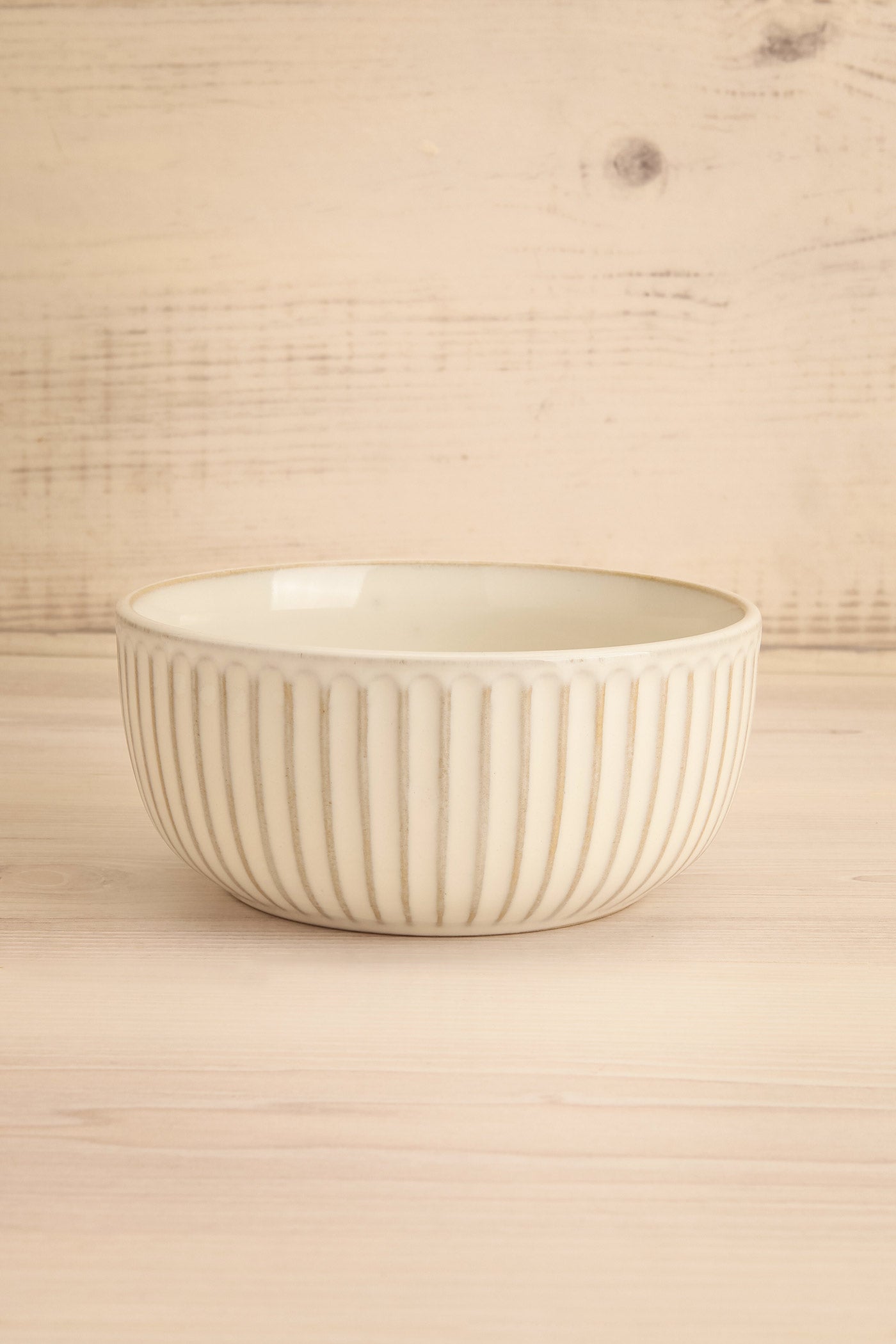 front view of Albedo Ribbed Ceramic Bowl at Maison garçonne