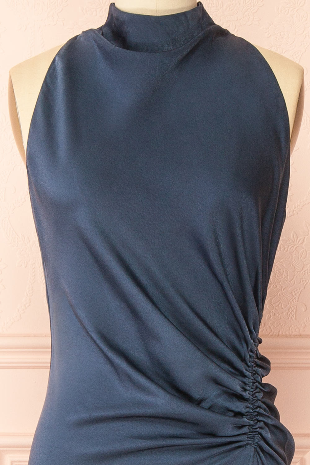 front of a sewing mannequin wearing the Alberta Navy Maxi Dress with a high neckline from Boutique 1861