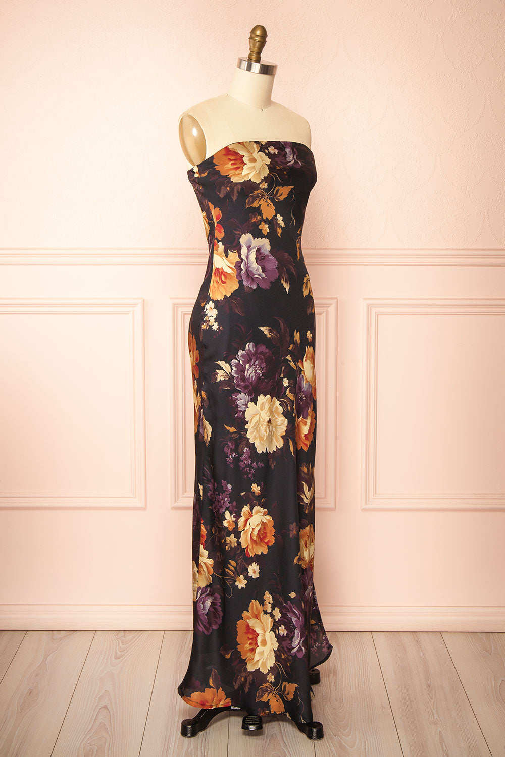 side view of a mannequin wearing the Aleana Floral Satin Strapless Dress from boutique 1861