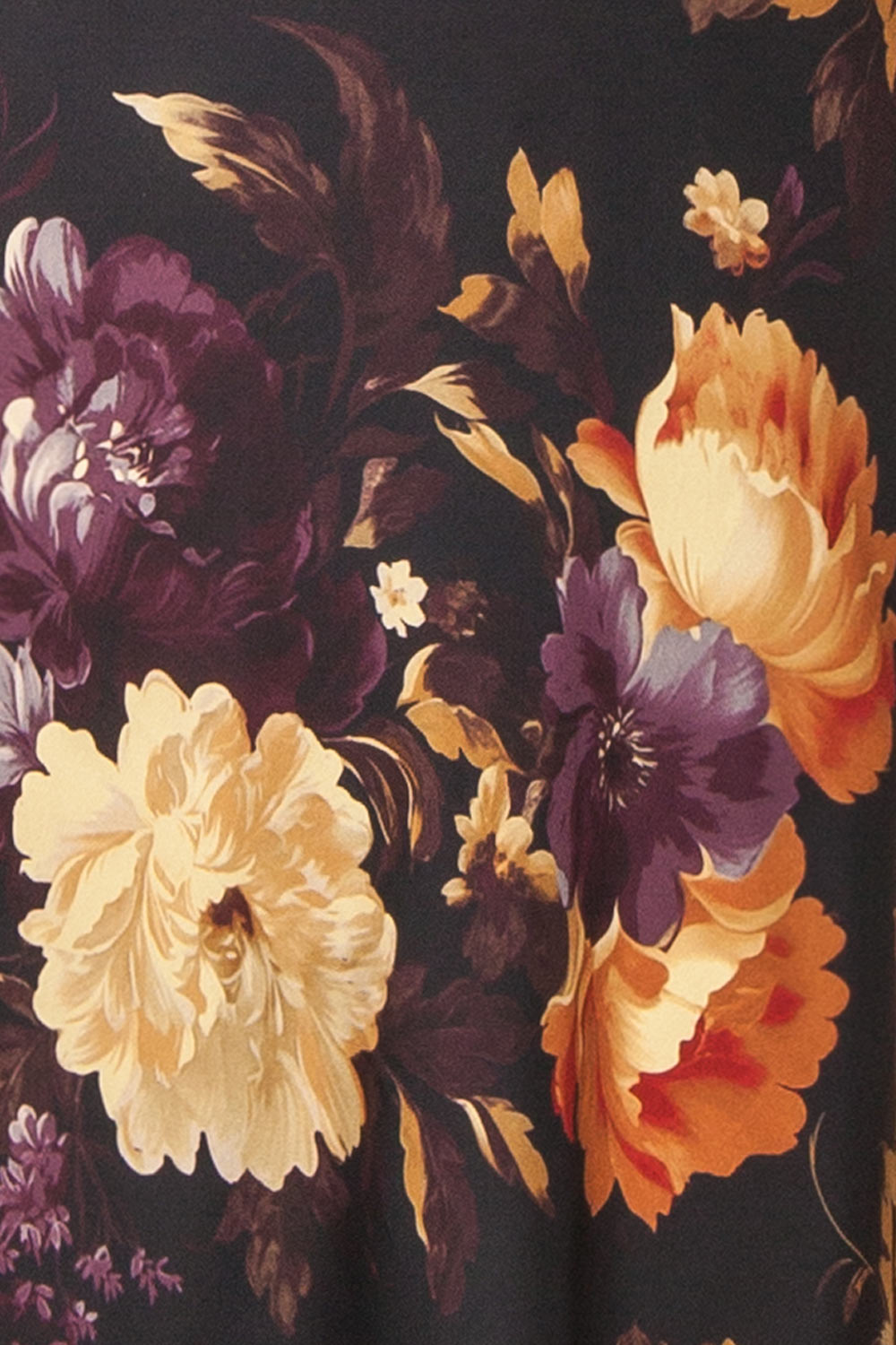 fabric of a mannequin wearing the Aleana Floral Satin Strapless Dress from boutique 1861