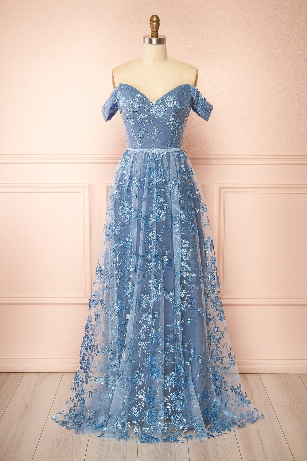 front view of sewing mannequin wearing Alienor Blue Grey Glittery Off the Shoulder Maxi Dress from Boutique 1861