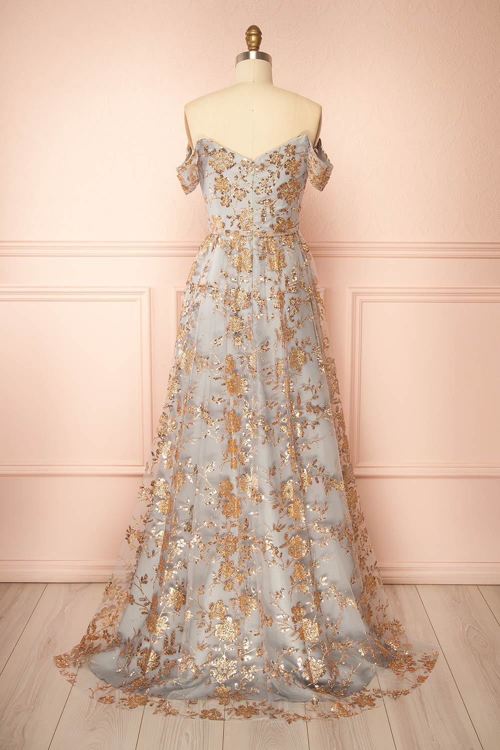 back view of sewing mannequin wearing Alienor Grey Glittery Off the Shoulder Maxi Dress from Boutique 1861