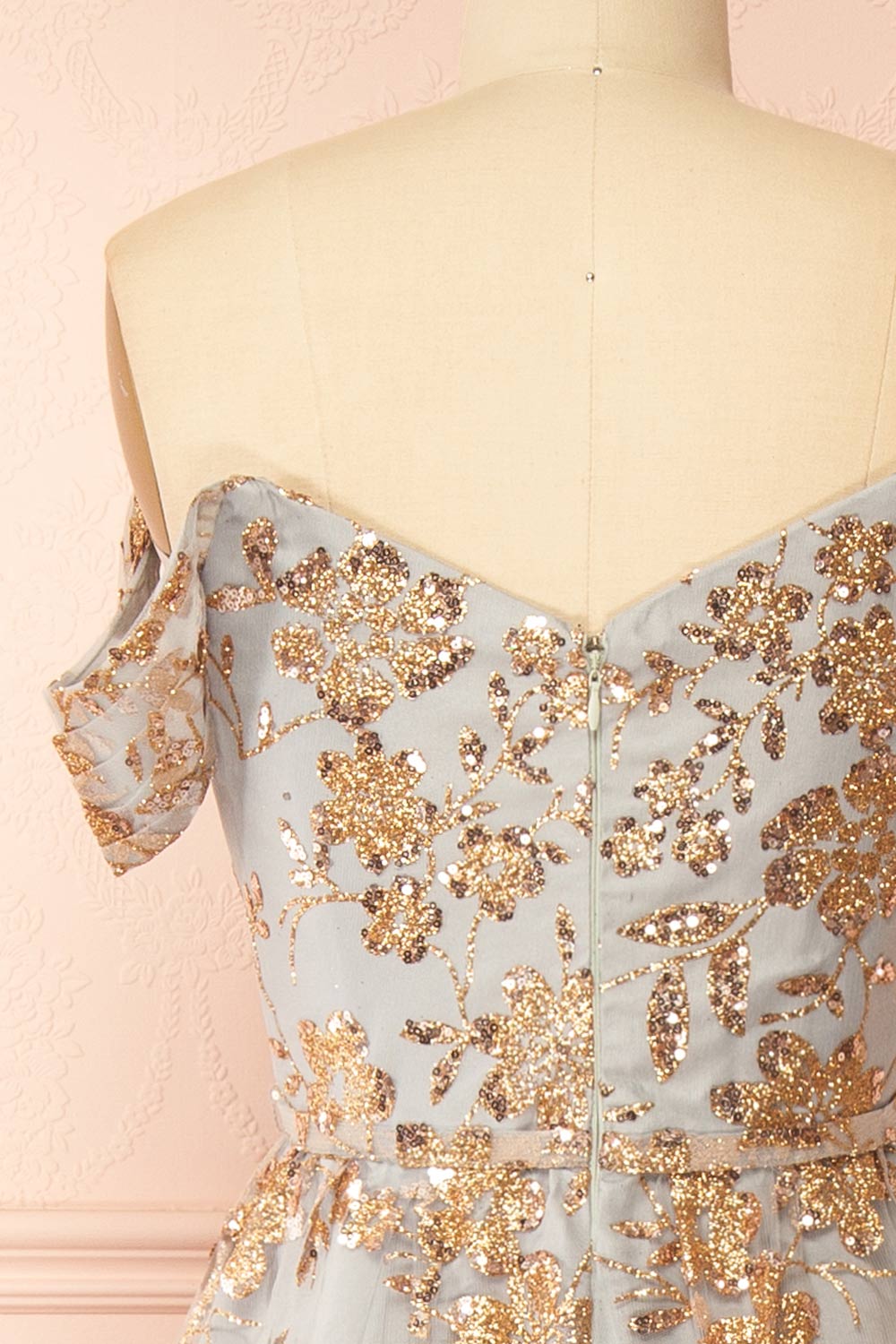 back of sewing mannequin wearing Alienor Grey Glittery Off the Shoulder Maxi Dress from Boutique 1861