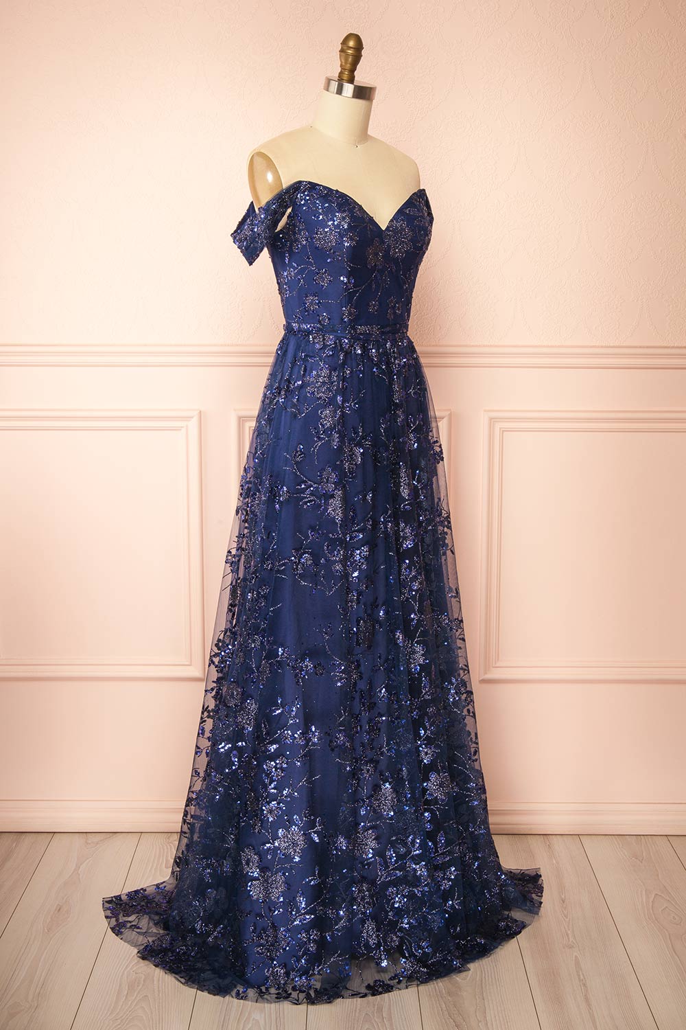side view of sewing mannequin wearing Alienor navy Glittery Off the Shoulder Maxi Dress from Boutique 1861