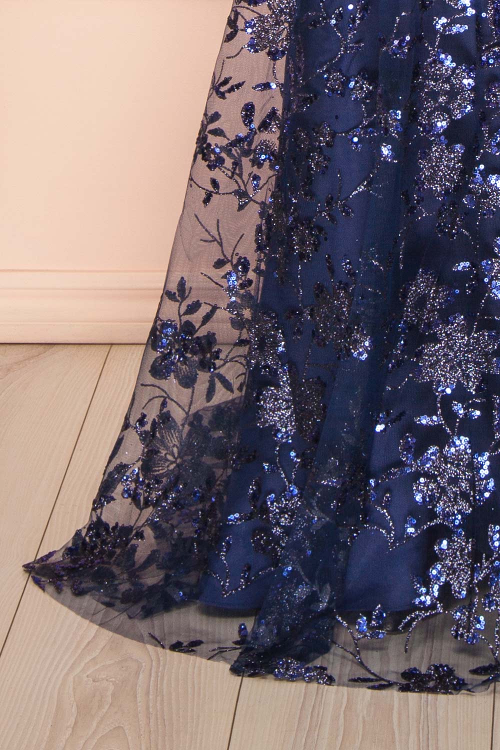 bottom of sewing mannequin wearing Alienor navy Glittery Off the Shoulder Maxi Dress from Boutique 1861