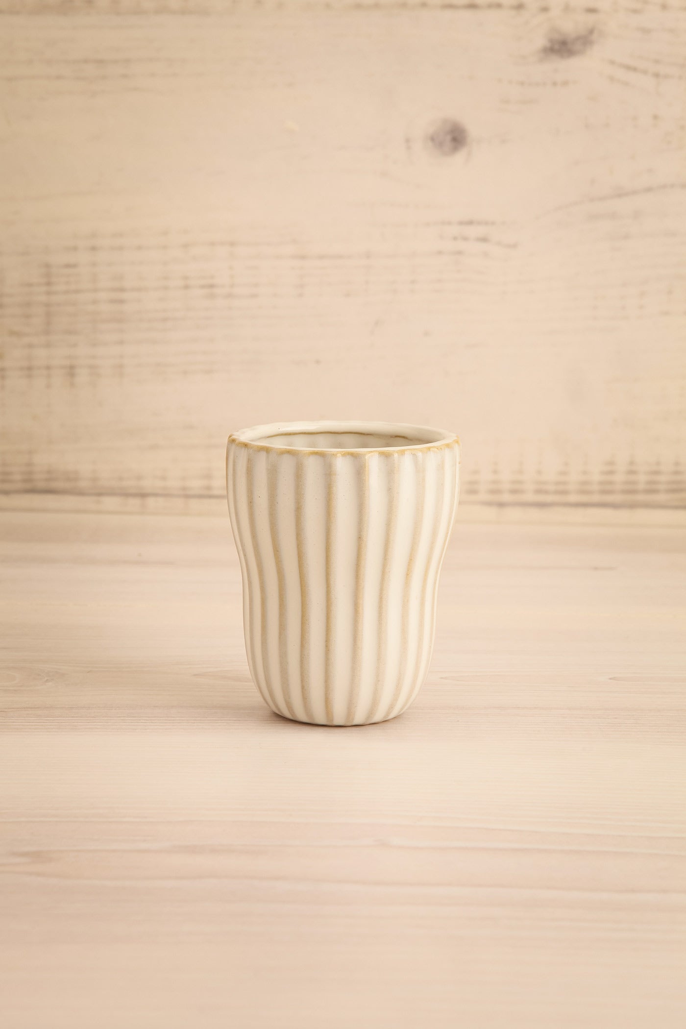 front view of Alsleben Small Ribbed Ceramic Cup at Maison garçonne