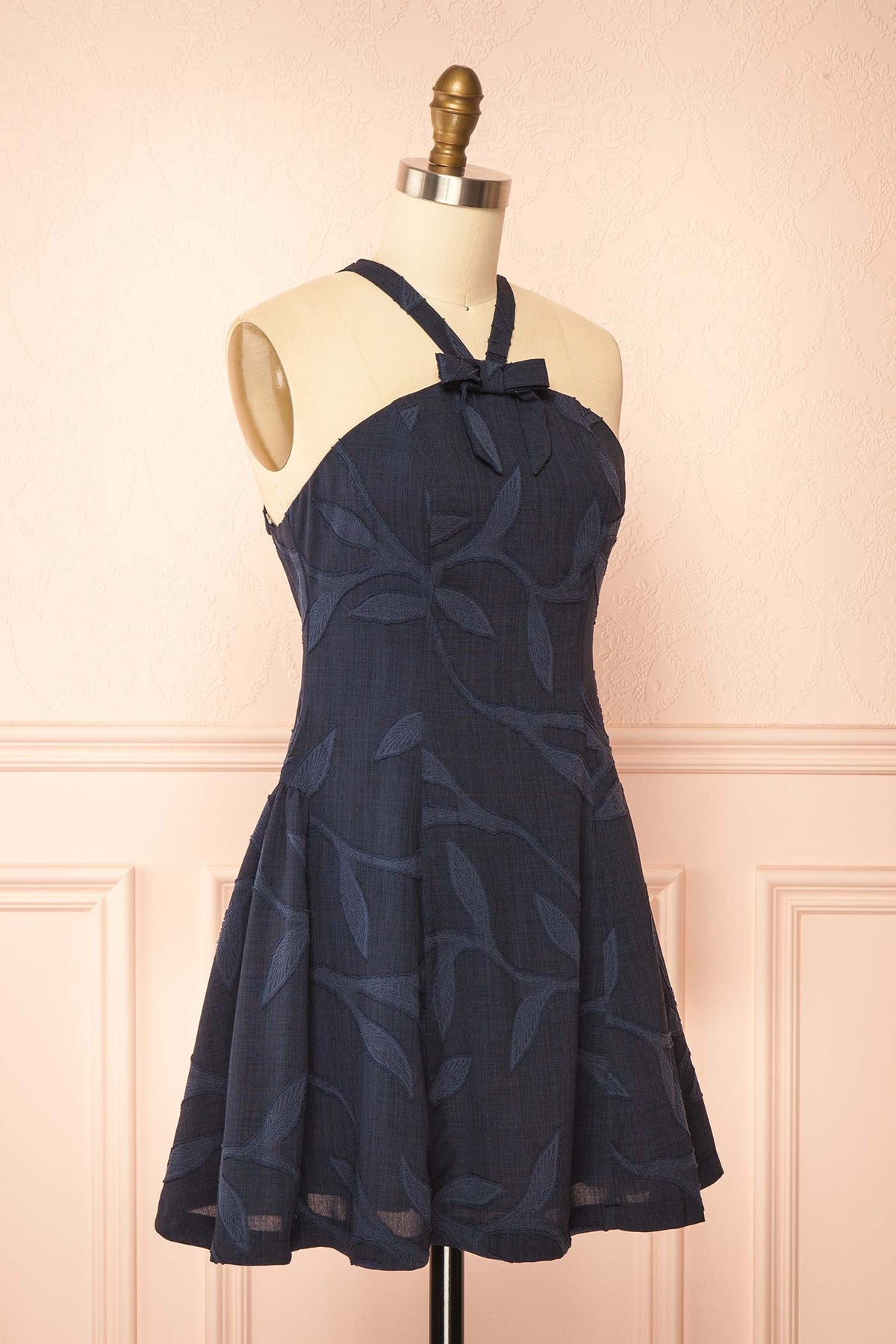 side view of Amadea Navy Short Halter Dress with Pockets at Boutique 1861