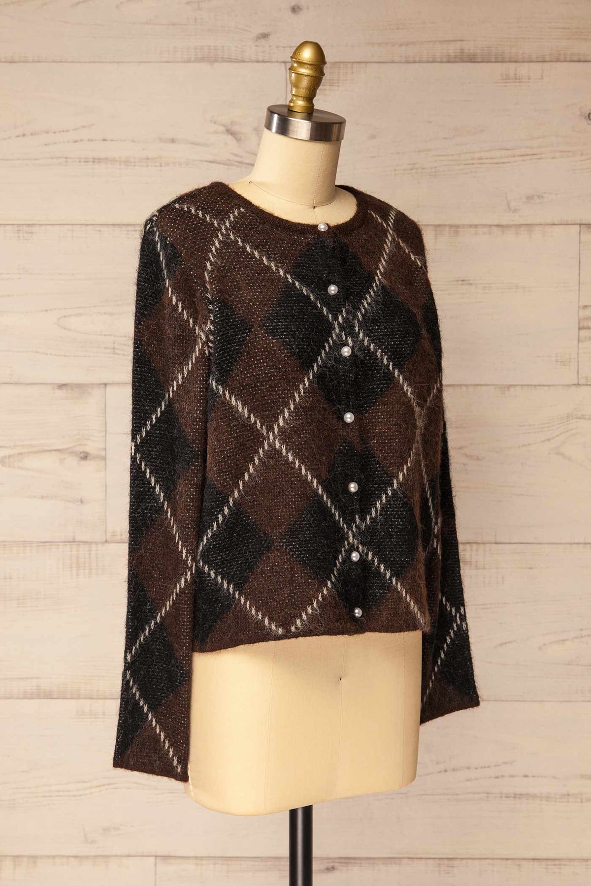 side view of Amqui Brown Argyle Knit Pearl Button Cardigan at La petite garçonne