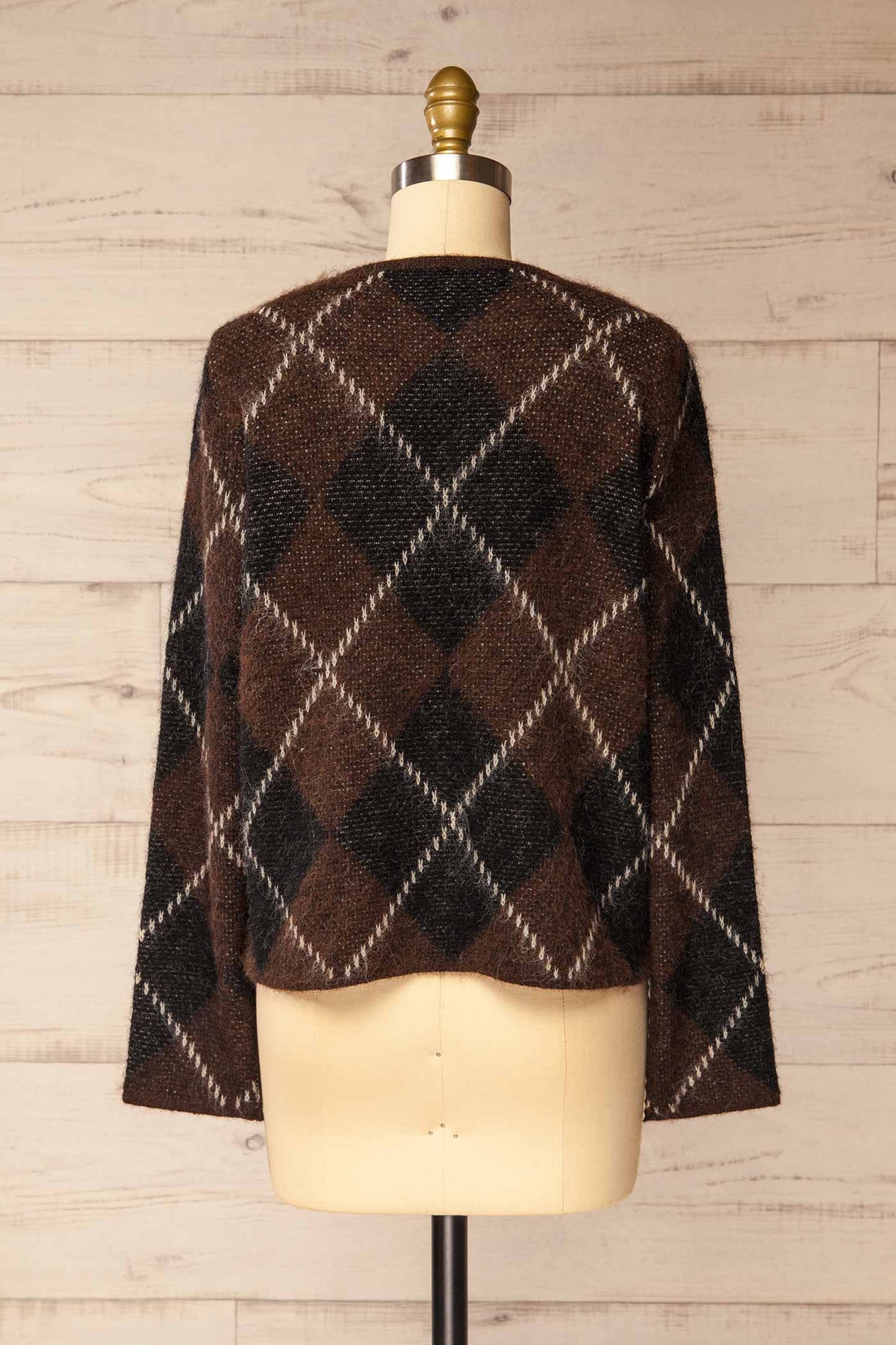 back view of Amqui Brown Argyle Knit Pearl Button Cardigan at La petite garçonne