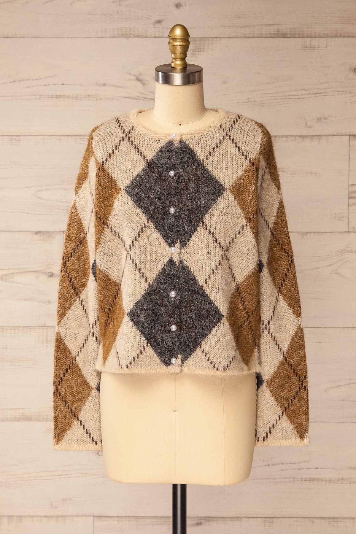 front view of Amqui Taupe Argyle Knit Pearl Button Cardigan at La petite garçonne