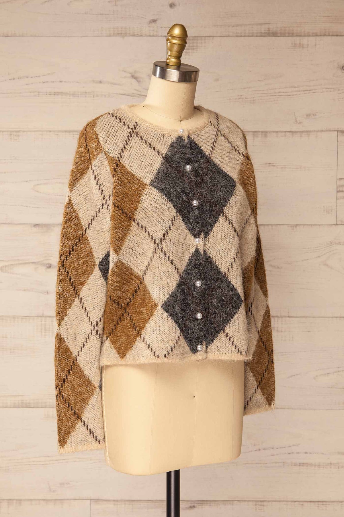 side view of Amqui Taupe Argyle Knit Pearl Button Cardigan at La petite garçonne