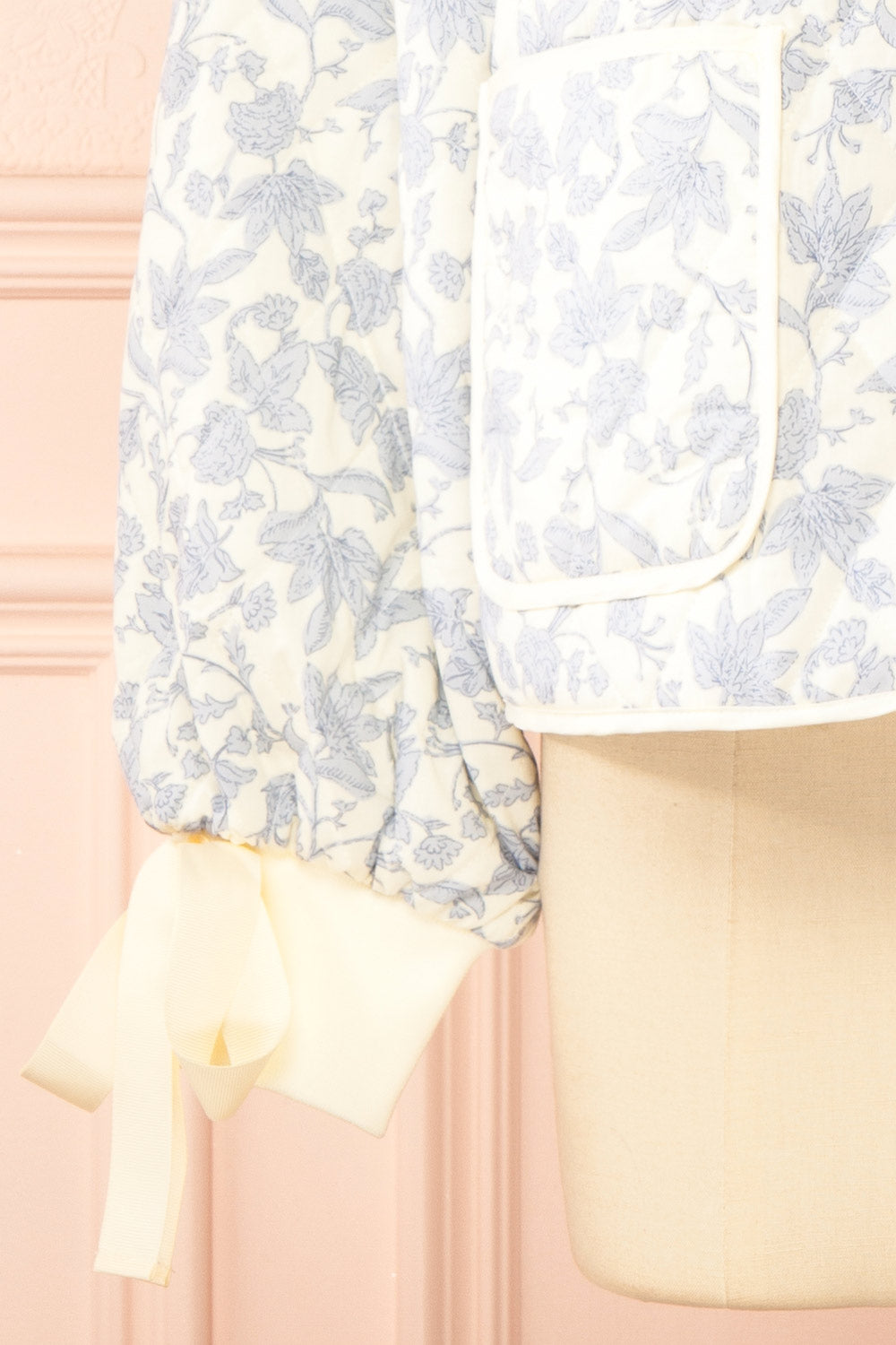 Anabeth Blue Floral Quilted Jacket with Ribbon-Tied | Boutique 1861 sleeve