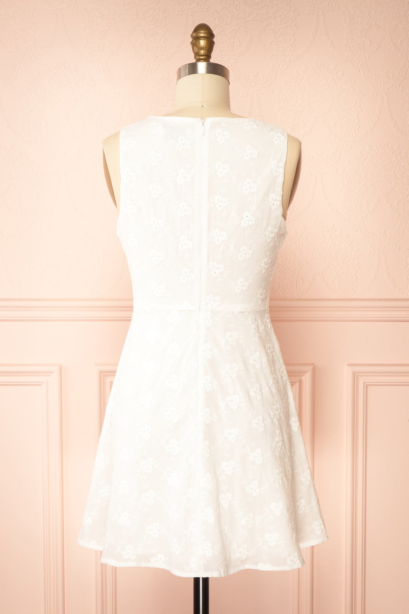 Back view Anysa White Floral Eyelet Mini Dress with Front Tie at boutique 1861